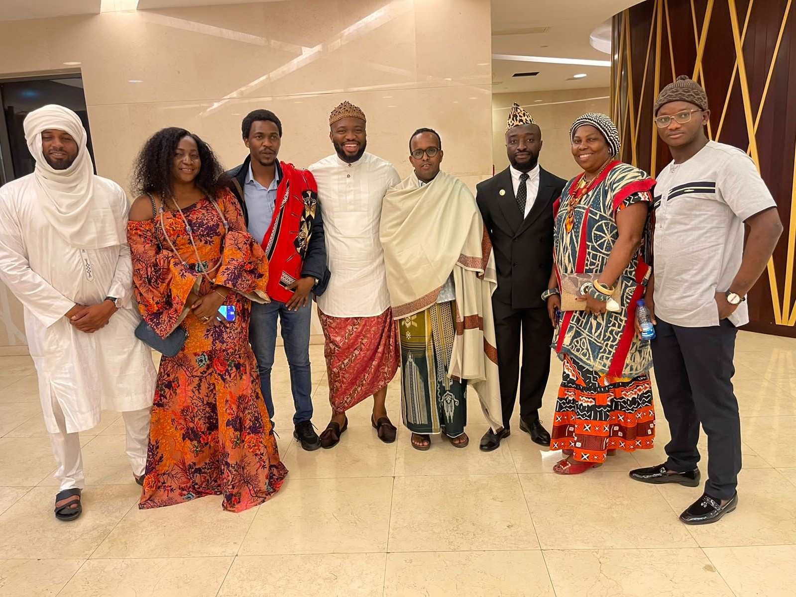 Young African changemakers in traditional attire at a cultural exchange